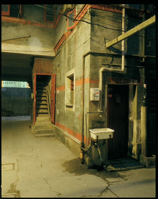 Greg Girard, Sink in Courtyard, Xikang Lu, 2003, Phantom Shanghai, c-prints, variable dimensions, courtesy of Magenta Books & Monte Clark Gallery. © Greg Girard
