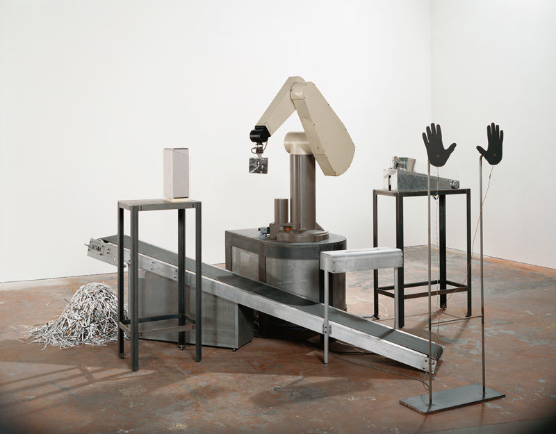 Max Dean, As Yet Untitled, 1992–95, installation view / vue d’installation Art Gallery of Ontario, Toronto, 1997, metal, rubber, electronic and mechanical components, photographs, plexiglas, archival paperboard box / métal, caoutchouc, composants électroniques et mécaniques, photographies, plexiglas, boîte de carton pour documents de longue conservation, 157 x 267 x 256 cm, gift of / don de Jay Smith, David Fleck, Gilles Ouellette and Terry Burgoyne, 2007, collection of / de Art Gallery of Ontario, courtesy of the artist and / permission de l’artiste et / the Art Gallery of Ontario. © Max Dean