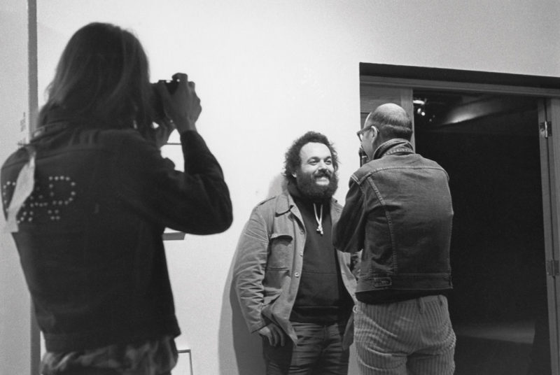 Gabor Szilasi, Michel Campeau being photographed by John Max being photographed by Roger Charbonneau at the opening of the Sam Tata exhibition at the Galeries de photographie du Centaur, Montreal, April 1974 / Michel Campeau photographié par John Max photographié par Roger Charbonneau au vernissage de l’exposition de Sam Tata aux Galeries de photographie du Centaur, Montréal, avril 1974